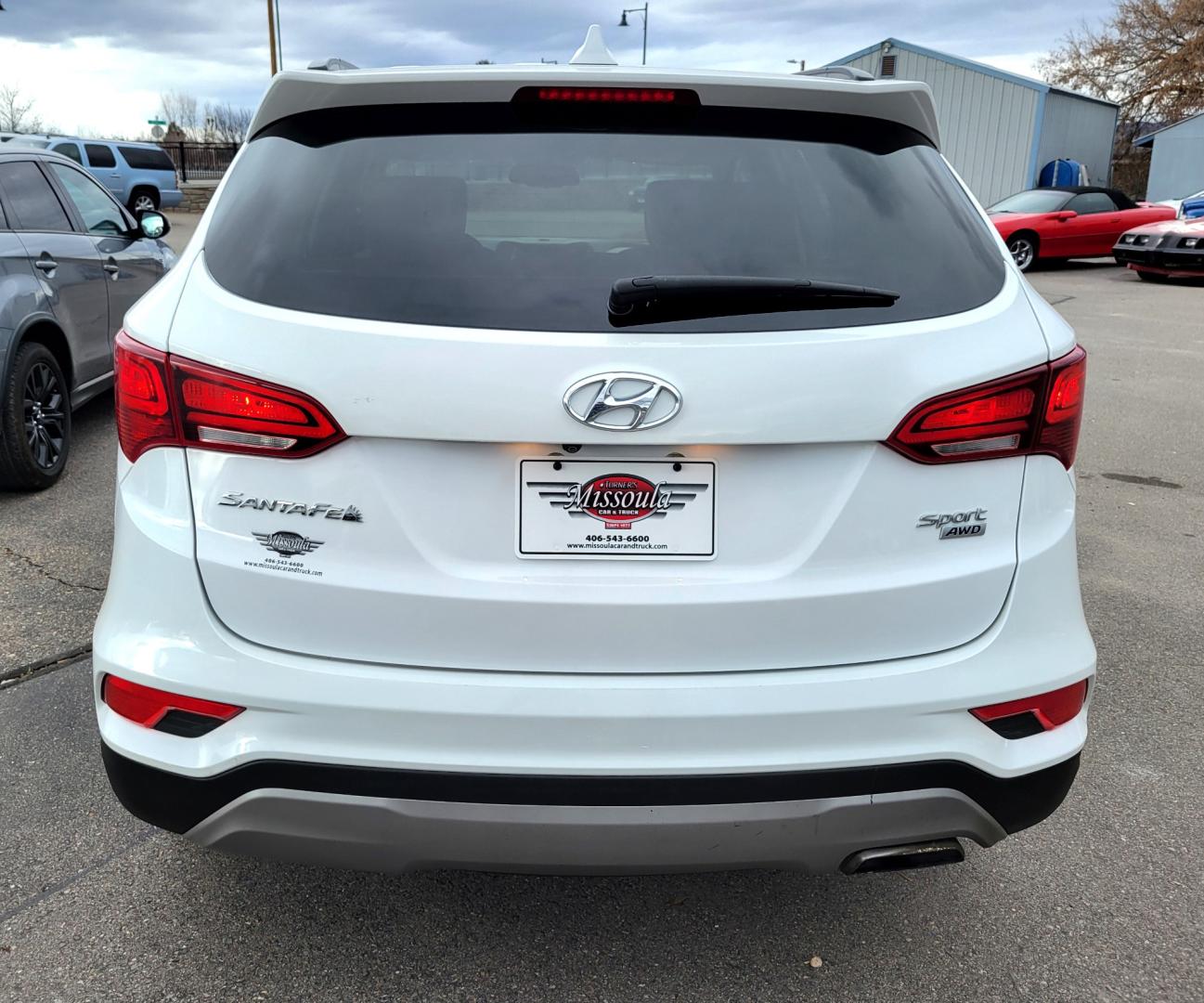 2017 White /Tan Hyundai Santa Fe Sport (5NMZUDLB9HH) with an 2.4L I4 engine, 6 Speed Auto transmission, located at 450 N Russell, Missoula, MT, 59801, (406) 543-6600, 46.874496, -114.017433 - Really Nice AWD SUV. 2.4L I4. 6 Speed Automatic Transmission. Remote Start. Backup Camera. Bluetooth. AM FM XM CD. Air. Cruise. Tilt. Power Windows and Locks. One Owner. Clean Carfax. - Photo#2